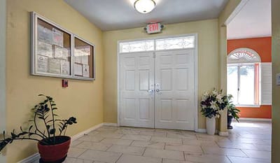 Welcoming entrance lobby with double doors