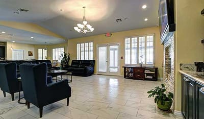 Common area with comfortable seating and lighting