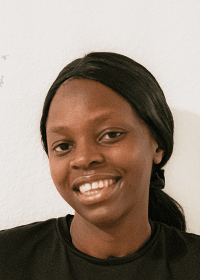 Smiling woman with a ponytail posing for the camera