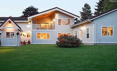 Exterior view of Newcastle Adult Family Home with garden