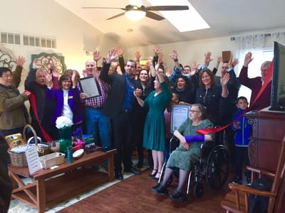 Residents and staff celebrating a milestone event