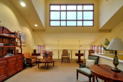 Bright common area with seating and decor