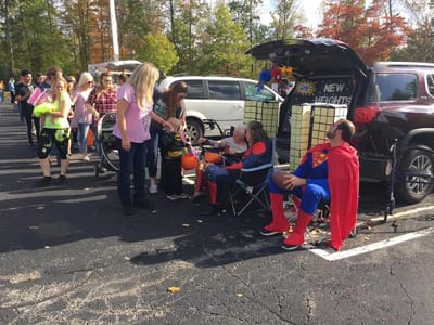 Residents and staff engaging in a community celebration outdoors