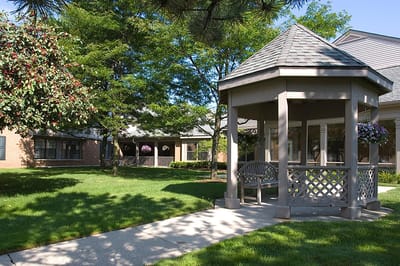 Outdoor gazebo in a landscaped area