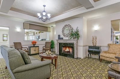 Cozy common area with seating and fireplace