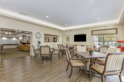 Bright dining area with tables and seating