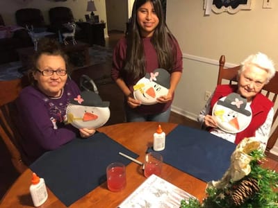 Residents making crafts during an activity session