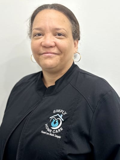 Staff member wearing Simply Home Care uniform