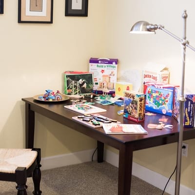 Activity table with games and crafts in a cozy room