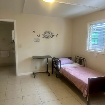 Simple resident room with a bed and décor