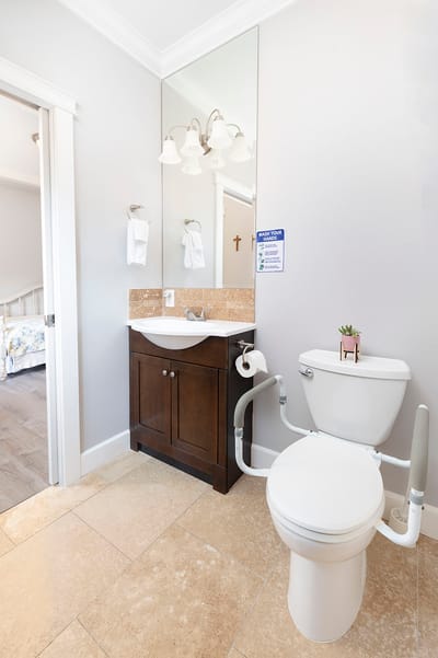 Accessible bathroom with safety features and minimal decor
