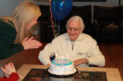 Resident celebrating a birthday with a cake