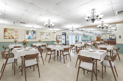 Dining room with tables set for meals
