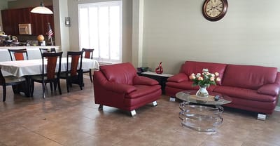 Bright interior common area with red furniture