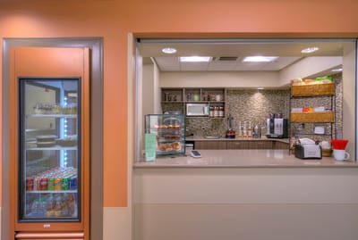 A well-lit kitchen area with food display