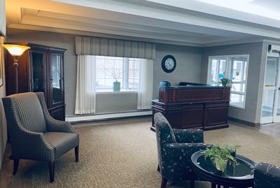 Interior lounge area with seating and reception desk