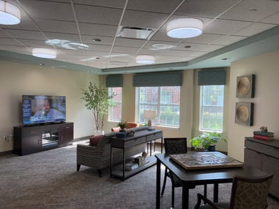 Bright interior common area with seating and natural light