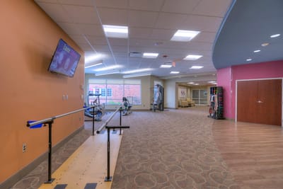Interior view of a fitness area with exercise equipment