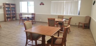 Cozy common area with tables and chairs