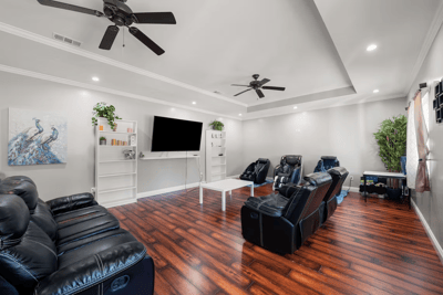 Common area with seating and entertainment options.