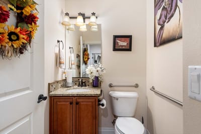 Interior view of a small bathroom with decor