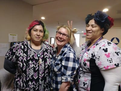Staff members enjoying a lighthearted moment in the facility