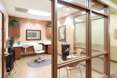 Interior view of a salon room within the facility