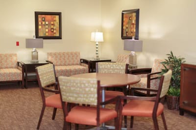 Comfortable lounge area with seating and lamps