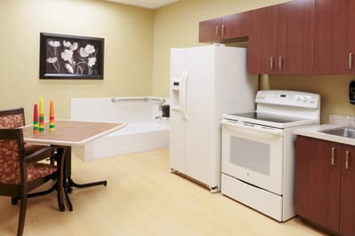 Interior view of a resident's kitchenette and dining area