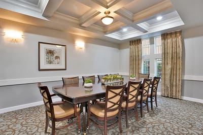 Interior common area with a dining table and chairs