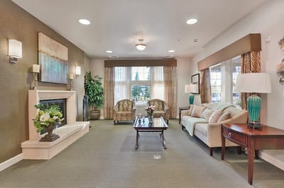Interior of a cozy common area with seating and decor