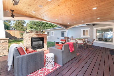 Covered outdoor seating area with comfortable furniture