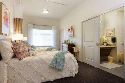 Cozy private room with twin beds and decor
