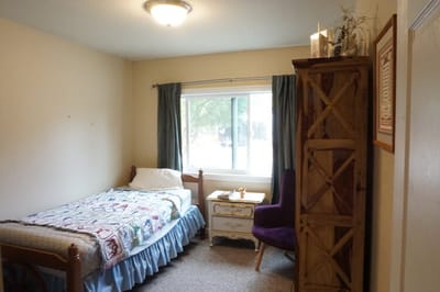 Cozy private room with a bed and window