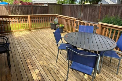 Outdoor patio area with seating and planters