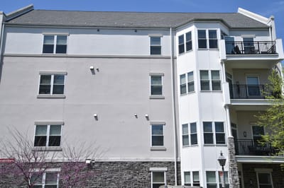 Exterior view of a multi-story senior living building