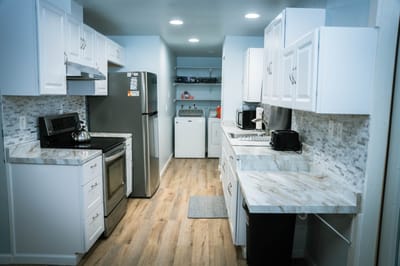 Bright kitchen area with modern appliances