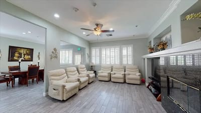 Interior common area with seating and a fireplace