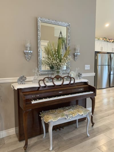 Interior view of piano and decor in facility