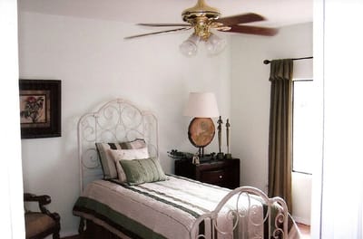 Cozy resident room with bed and decor