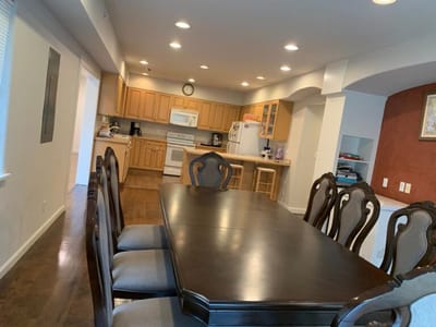 Interior view of a dining area with a large table