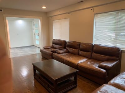 Cozy common area with couches and natural light