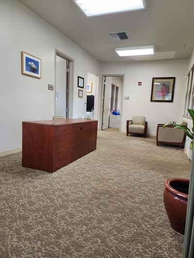 Reception area with desk and seating