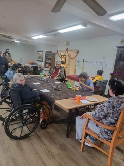 Residents enjoying a meal in a common area