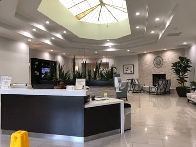 Interior view of a bright lobby with seating areas