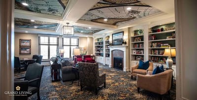 Cozy common area with bookshelves and seating