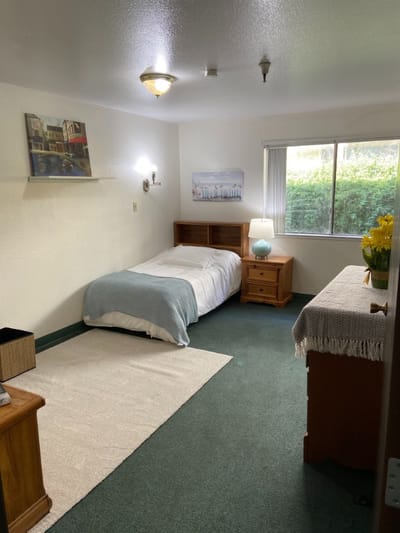 Cozy resident room with a single bed and window