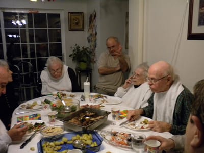 Residents enjoying a meal together in a dining area