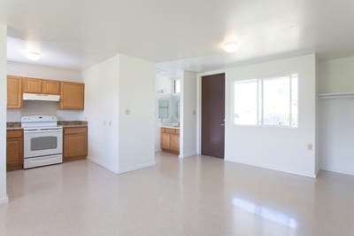 Interior view of a resident room with kitchen appliances
