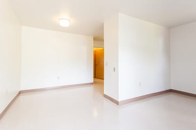 Empty interior room with minimal furnishings